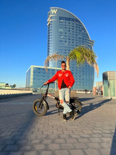 "Fat tire electric bike navigating Barcelona streets, offering comfortable and eco-friendly exploration of the city's landmarks and attracti